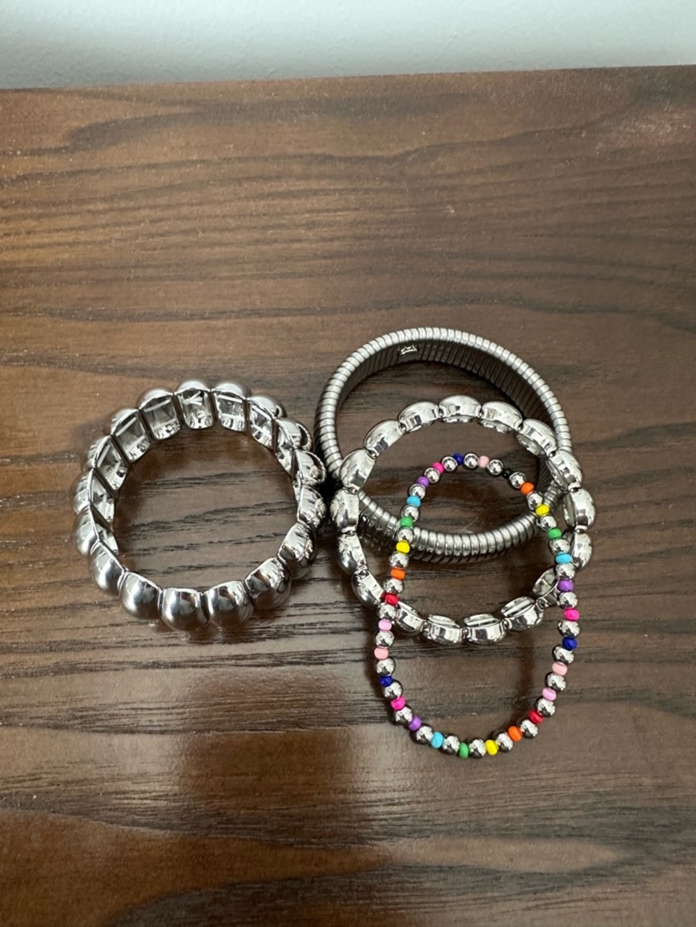 Set of Silver Tone Bangle Bracelets with Rainbow Beaded Accent - Picture 3 of 3